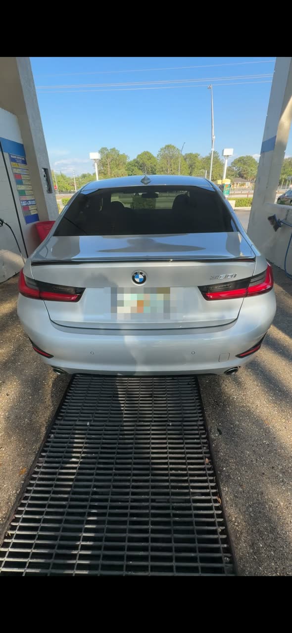 White BMW sedan finished detail