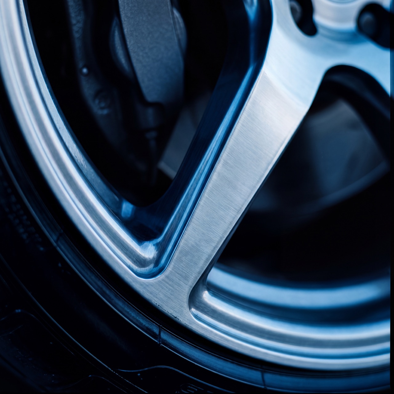 Macro of brushed alloy wheel spoke